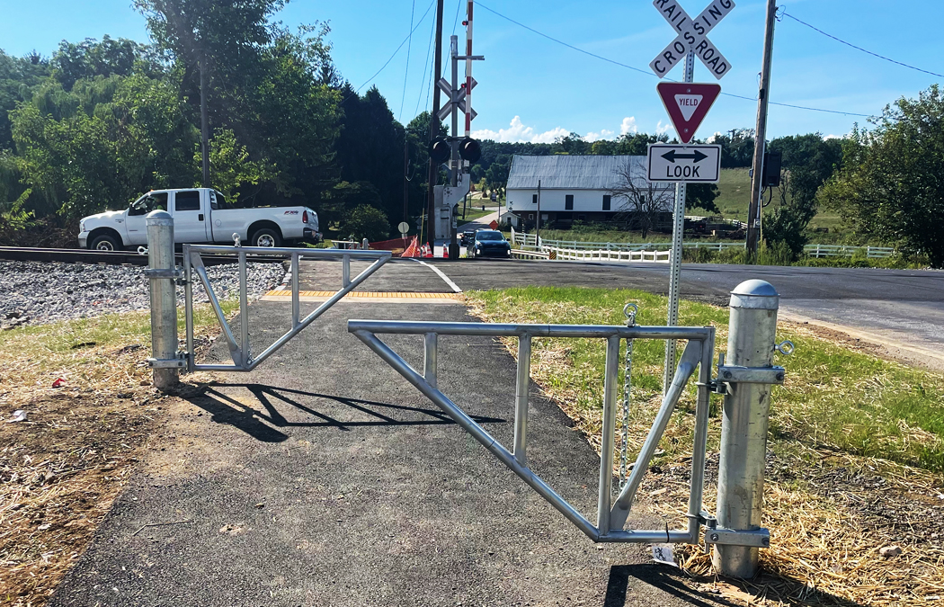 swing gate at bike path railroad crossing
